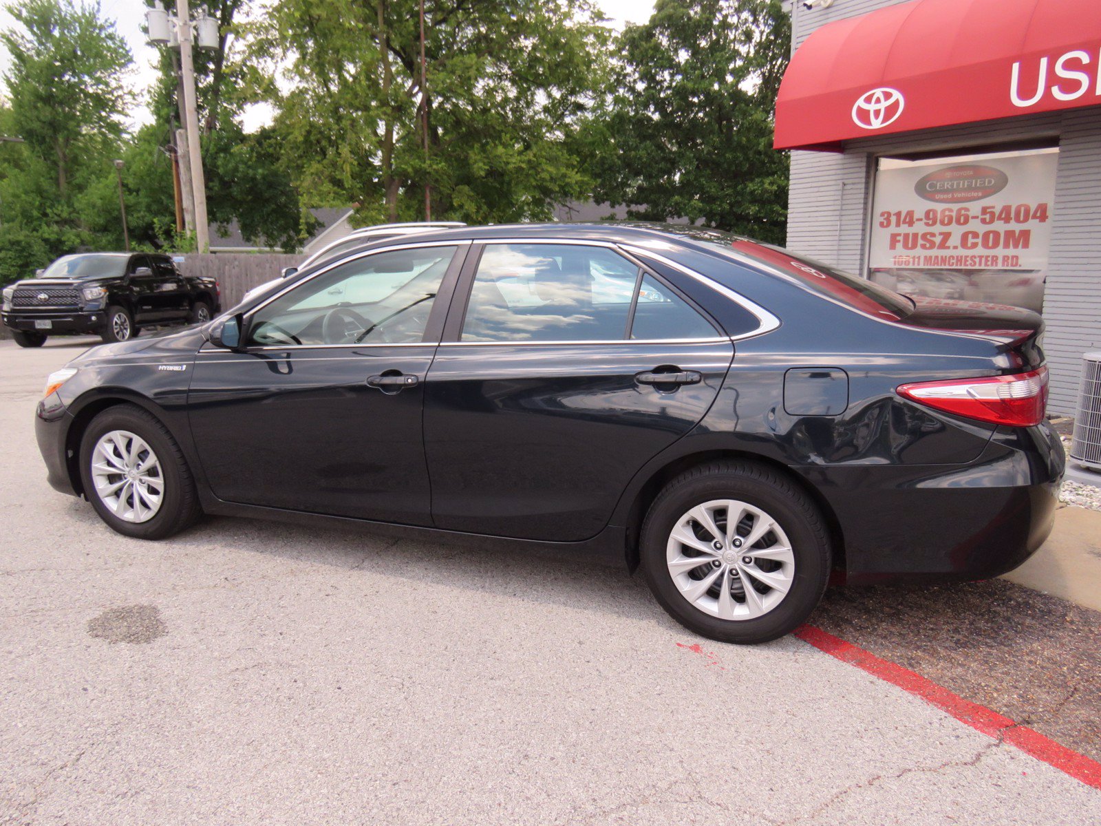 Pre-Owned 2015 Toyota Camry Hybrid LE FWD Sedan